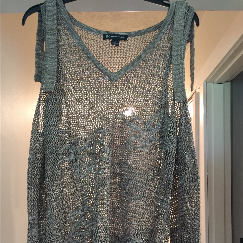 Gold V neck, open shoulder long sleeve sweater.